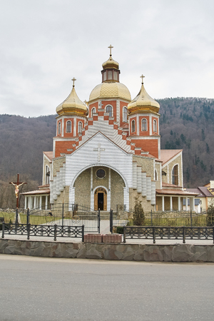 City landscape with church. Yaremche, Ukraine. Vertical viewの写真素材