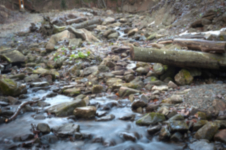 Blurred image of mountain river. Background for designの写真素材