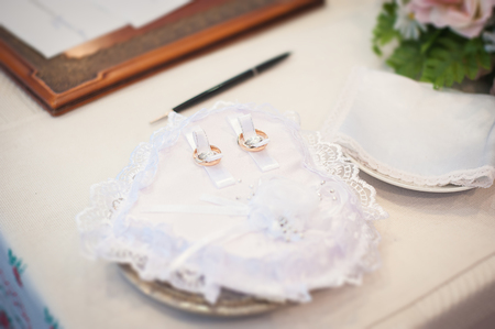 Wedding rings. Wedding symbols, attributes. Holiday, celebration. Tilt-shift effectの写真素材