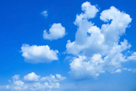 Beautifull soft white clouds against blue sky. Place for text