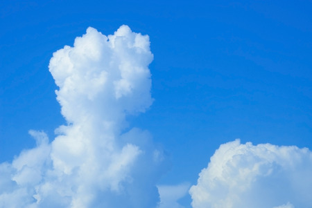 Beautifull soft white clouds against blue sky. Place for text