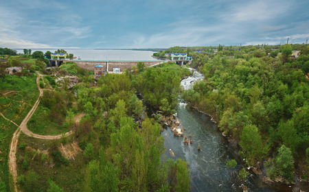 Panoramic view over a landscape of river, lake and forest. HDR effect. Wide angle panoramaの写真素材