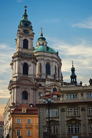 St. Nicholas Church in Prague. Kostel sv. Mikulase. Cathedral in old town. Sunsetの写真素材