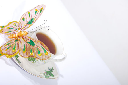 Cup of coffee with butterflyの写真素材