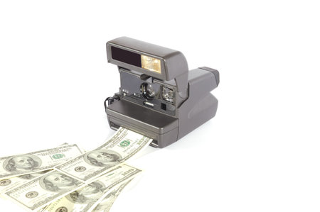 Old instant film camera making money