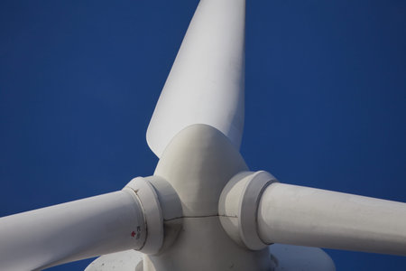 Wind mill turbine over the blue sky, Toronto, Canadaの写真素材