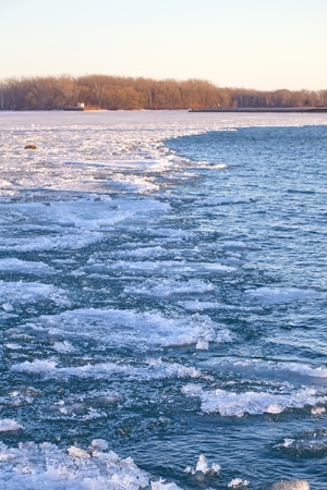 Melting ice in lake Ontario watersの写真素材
