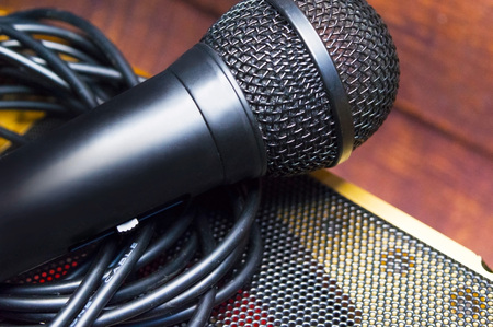 Microphone and wire close-up on a blurred backgroundの写真素材
