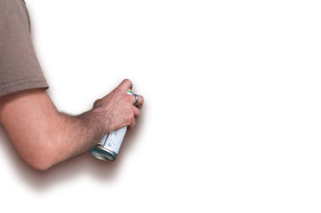 Artist's hand with spray paint.の写真素材