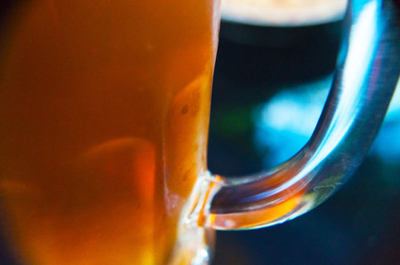 Closeup of a glass of fresh and cold beerの写真素材