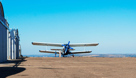 Old Biplane at the airfield near the hangar