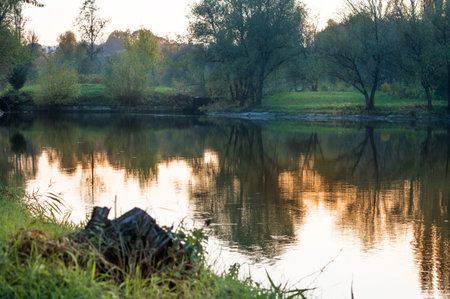 Autumn river at sunset in late autumn