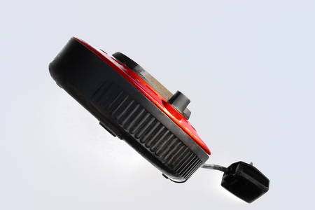 Black and red electrical extension cable isolated on whiteの写真素材