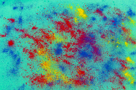 Subtractive primary colors of toner powder isolated on a green backgroundの写真素材