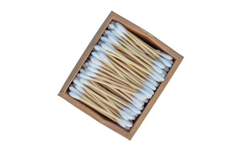 A small box containing recyclable bamboo cotton buds isolated on a white backgroundの写真素材
