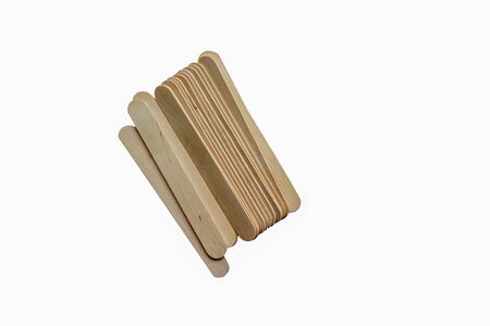Large ice lolly sticks isolated on a white background used in craft workの写真素材