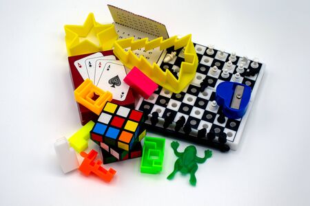 A top down view of novelty games and items from Christmas crackersの写真素材