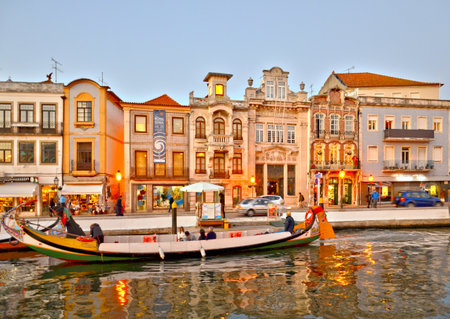 View of the main city canal in Aveiro with traditional buildings, Portugalの写真素材