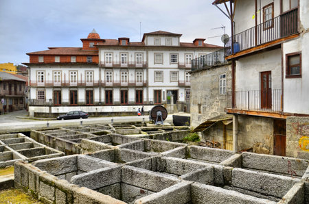 The heart of the tradition of tanning and beating hides in Guimaraes, Portugalの写真素材