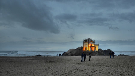 Chapel of Senhor da Pedra at nightfall in Miramar, Portugalの写真素材