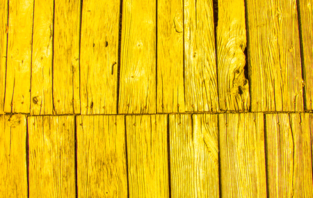 wooden texture background in yellow colorの写真素材