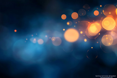 Experience the magic of abstract bokeh lights. Soft, glowing orbs in warm orange and cool blue create a dreamy, celebratory atmosphere perfect for adding a touch of wonder.の素材