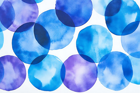 A beautiful abstract pattern composed of overlapping watercolor circles in varying shades of blue and purple. This soft and artistic texture is perfect for backgrounds and design elements.の素材
