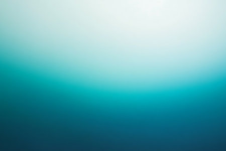 Abstract digital art featuring a pixelated gradient of ocean blues and aquas, evoking the serene and mysterious depths of the sea and light play.の素材