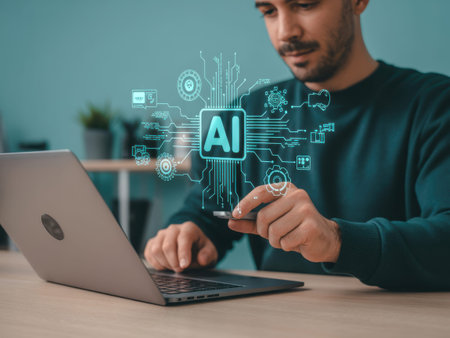 A man sits at a desk using a laptop and holding a smartphone with an AI interface on the screen. The interface a circuit board with various and the letters AI in teal. The man wears a dark......の素材