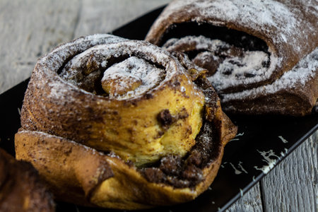 sweet buns on a rough wooden backgroundの写真素材