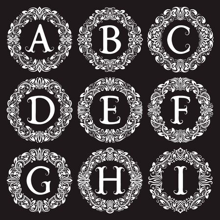 Vintage monograms set of letters from A to I in round patterned frames. Isolated elements for logo design.のイラスト素材