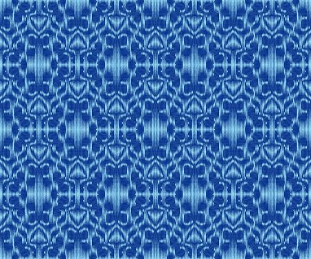 Original patterned fabric indigo dyed ikat seamless pattern.