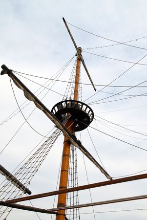 Historic ship replica - mast with rope ladder and surveillance nestの写真素材