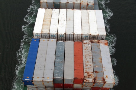 VARNA, BULGARIA - DECEMBER 14: Cargo ship WARNOW VAQUITA (Year Built: 2008) sails into open sea on December 14, 2010 in Varna, Bulgaria. Ship`s next destination is Constanta, Romania.のeditorial素材