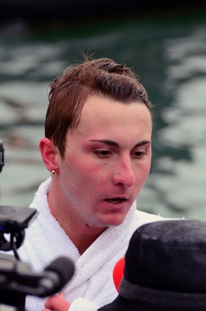 VARNA, BULGARIA - JANUARY 6: Anzhel Dimitrov recovered the cross for a forth successive year. Bulgarian Eastern Orthodox Church honors Epiphany on January 6, 2011 in Varna, Bulgaria のeditorial素材