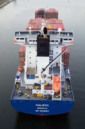 VARNA, BULGARIA - JANUARY 20: Cargo ship CALISTO (Flag: Liberia, IMO: 9306067) sails into Port of Varna-West to be loaded with containers on January 20, 2011 in Varna, Bulgaria. のeditorial素材