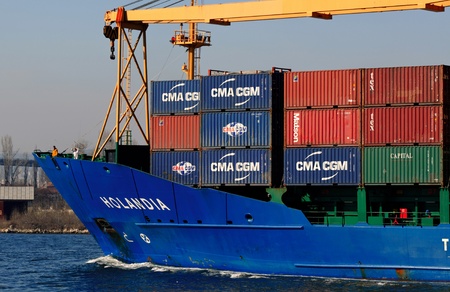VARNA, BULGARIA - MARCH 14: Cargo ship HOLANDIA (Flag: Antigua Barbuda, Year Built: 2000) sails into...