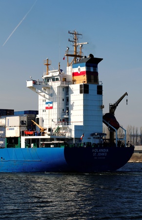 VARNA, BULGARIA - MARCH 14: Cargo ship HOLANDIA (Flag: Antigua Barbuda, Year Built: 2000) sails into Port of Varna-West to be loaded with containers on March 14, 2011 in Varna, Bulgaria. のeditorial素材
