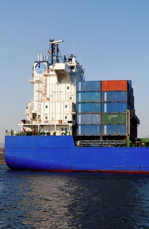 VARNA, BULGARIA, MARCH 14: Turkish cargo ship HILDE A (Year Built: 2005, Dead Weight: 22033 t) is sailing away into open sea after a short stay in Varna-west port on March 14, 2014 in Varna, Bulgariaのeditorial素材