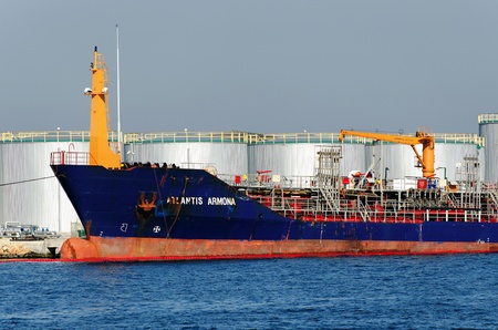 VARNA, BULGARIA - MARCH 14: Tank ship ATLANTIS ARMONA (Year Built: 2004, DeadWeight: 3517 t) moored at a special oil terminal in Port of Varna on March 14, 2010 in Varna, Bulgaria.のeditorial素材