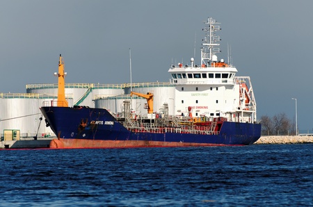 VARNA, BULGARIA - MARCH 14: Tank ship ATLANTIS ARMONA (Year Built: 2004, DeadWeight: 3517 t) moored at a special oil terminal in Port of Varna on March 14, 2010 in Varna, Bulgaria.のeditorial素材