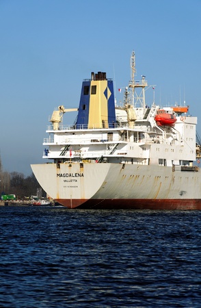 VARNA, BULGARIA - MARCH 14: Cargo ship MAGDALENA (Year Built: 1988, Dead Weight: 13864 t) is sailing away into open sea after a short stay in Varna-west port on March 14, 2011 in Varna, Bulgariaのeditorial素材