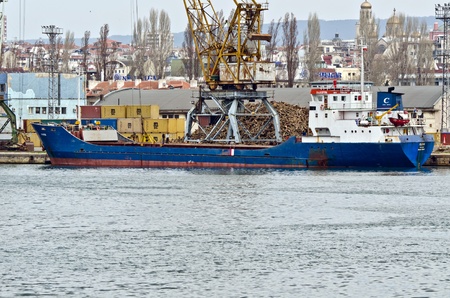 VARNA, BULGARIA - APR 08: Cargo ship PASIFIC 1 (Built: 1976, IMO: 7504469) is loaded with 1400...