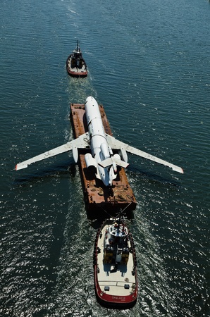 VARNA, BULGARIA - MAY 23, 2011: Airplane is tolled on a platform on May 23, 2011 in Varna, Bulgaria....