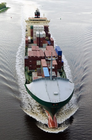 VARNA, BULGARIA-MAY 13: Cargo ship ERNST RICKMERS (Year Built: 2000, Flag: Marshall Is) sails away into open sea after a short stay in Varna-west port on May 13, 2011 in Varna, Bulgaria. のeditorial素材