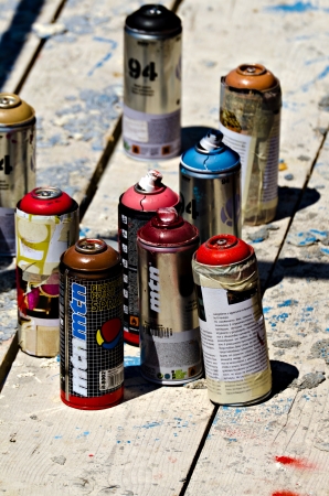 VARNA, BULGARIA - JUNE 2: Color spray cans used by graffiti artists at the "Creatures from Black Sea" Sprite Graffiti Jam in Port of Varna, on June 2, 2011 in Varna, Bulgaria.のeditorial素材