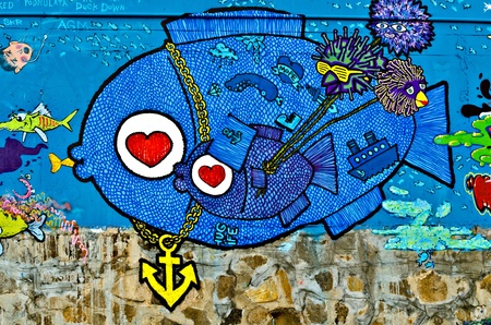 VARNA, BULGARIA - JUNE 5: Part of the eighty meters long graffiti painted on the breackwater wall at Port of Varna as part of the "Creatures from Black Sea" Sprite Graffiti Jam 2011 on June 5, 2011 in Varna, Bulgaria.のeditorial素材