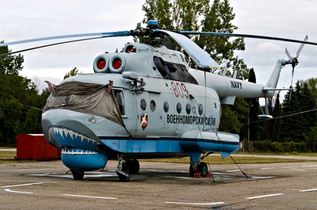 VARNA, BULGARIA - OCTOBER 9: Old submarine-locating and combat helicopter Mi-14 PL waiting to be replaced by the new Panther helicopters delivered by Eurocopter on October 9, 2011 in Varna, Bulgaria.のeditorial素材