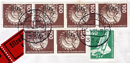 FEDERAL REPUBLIC OF GERMANY - CIRCA 1975: Stamps printed in Federal Republic of Germany, show a space shuttle and Rotary Bituminous coal excavator, circa 1975のeditorial素材