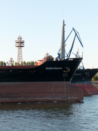 VARNA, BULGARIA - JULY 21: Bulk carrier SIDER FAIOCH, Flag: Italy, Year Built: 1986, sails into open sea on July 21, 2012 in Varna, Bulgaria. Ship`s next destination is Taman, Russia.のeditorial素材